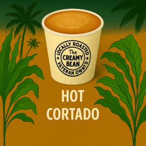 Hot Cortado in branded to-go cup with tropical background