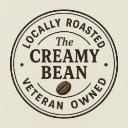 The Creamy Bean logo 250x250 featuring a coffee cup with rich espresso tones and cacao accents.